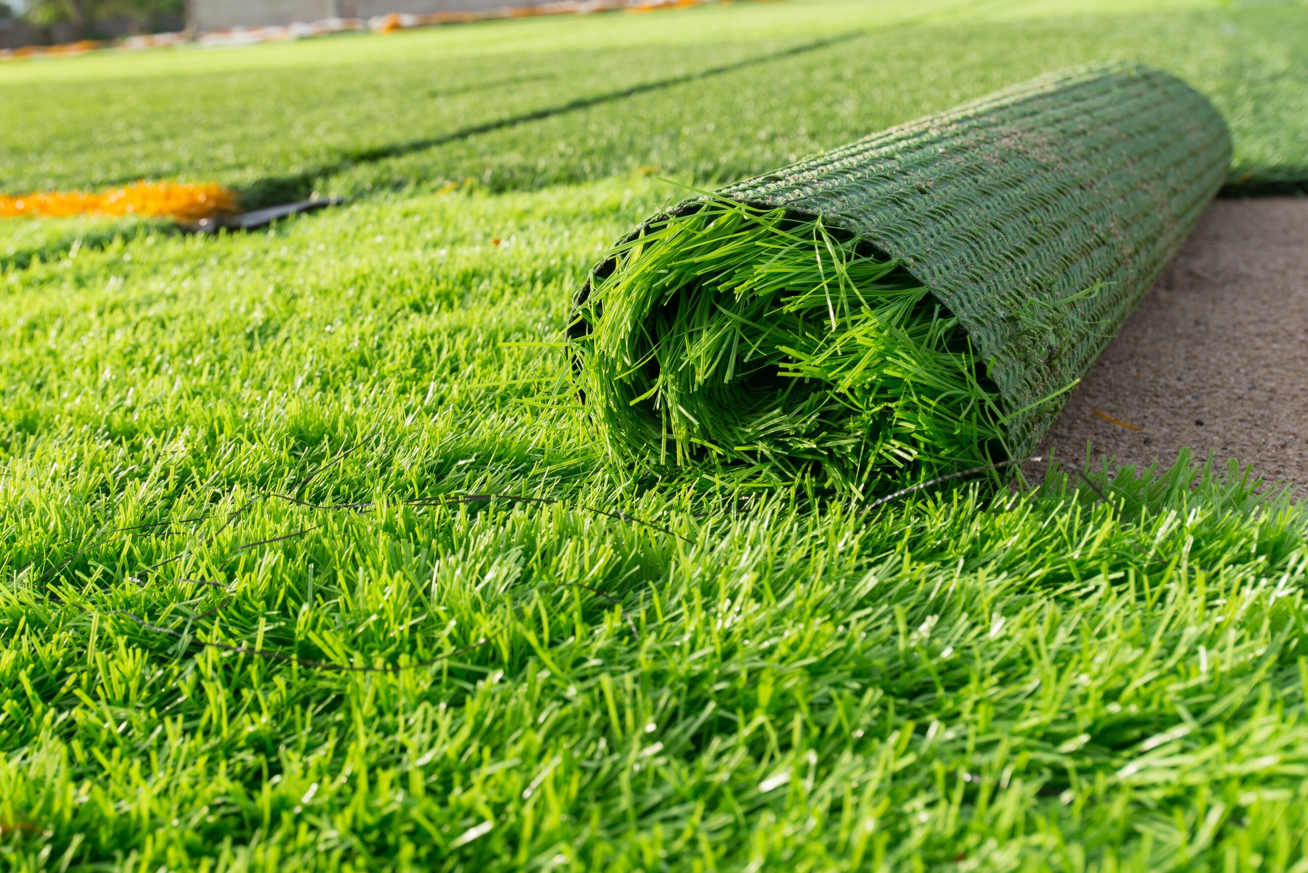 Synthetic grass turf ready for outdoor landscaping projects.