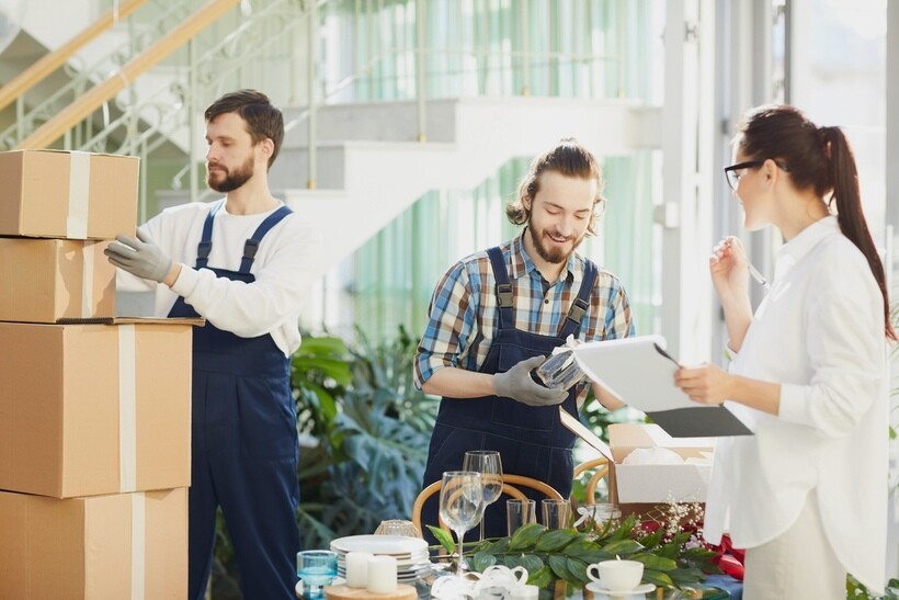 Team preparing wedding decorations under the guidance of a wedding planner. - wedding planner vs wedding coordinator