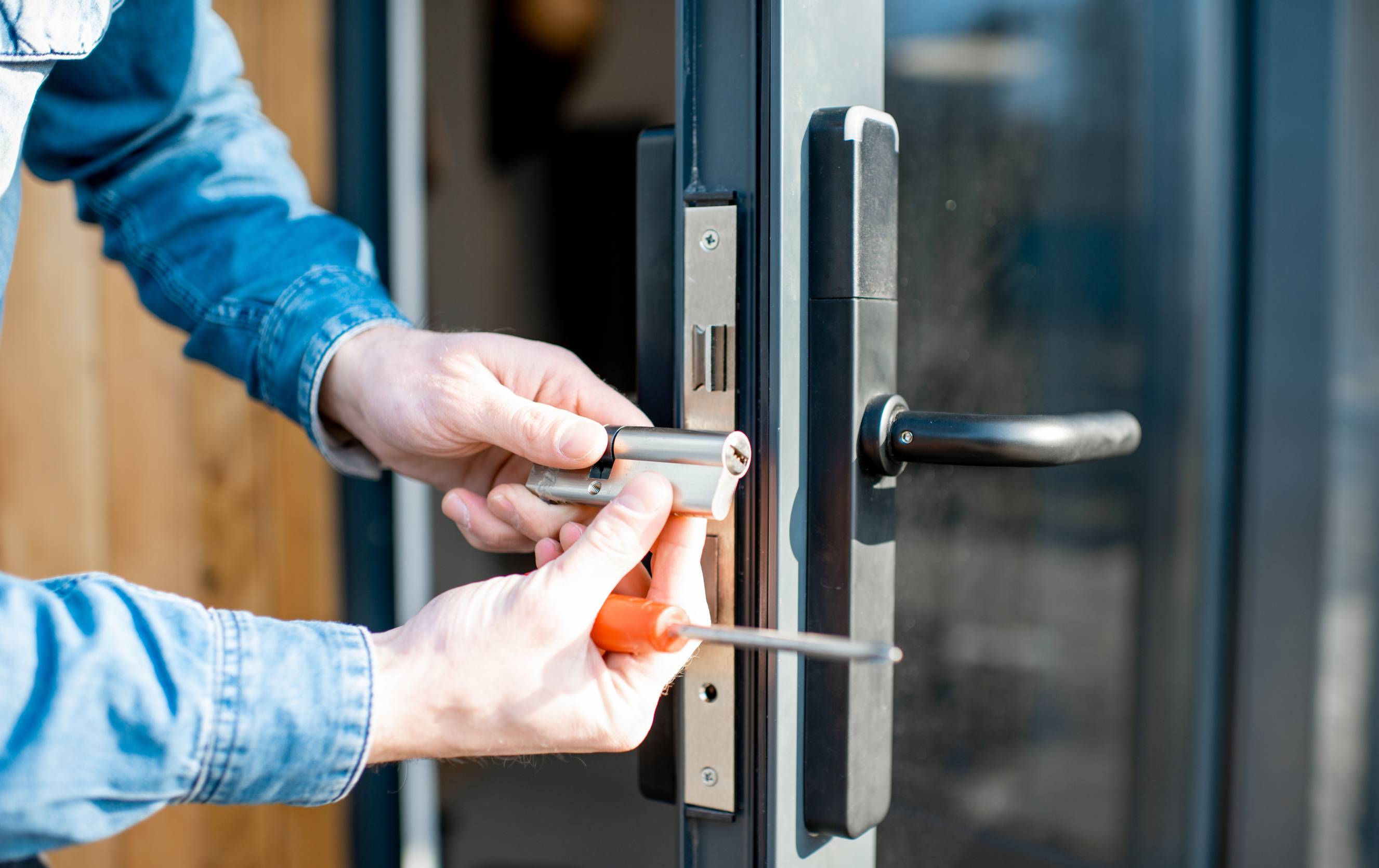 a locksmith successfully unlocking a door for a client