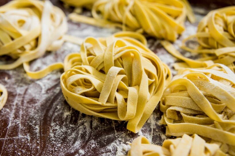 spaghetti vs linguine - Freshly made linguine-style pasta bundles ready to cook