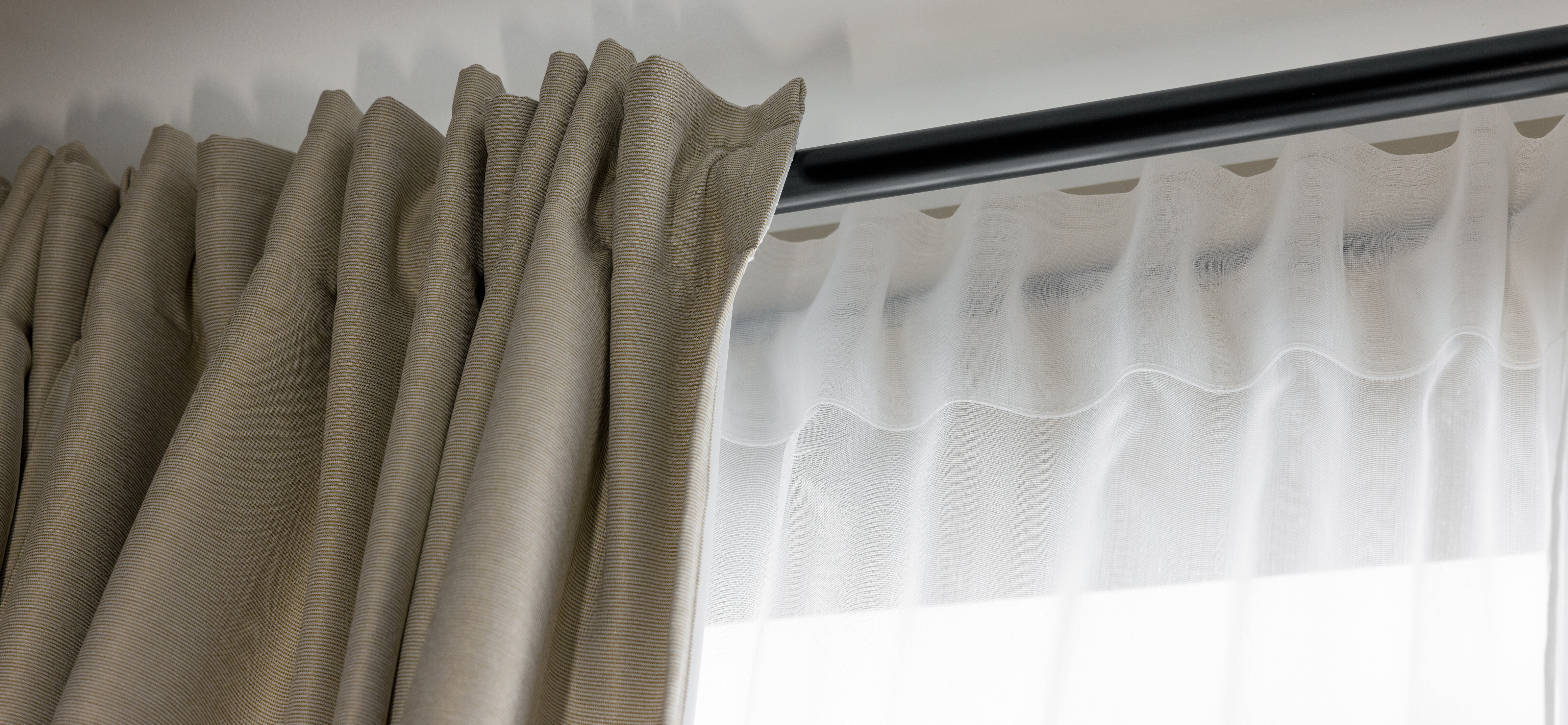 Curtain ideas - Beige curtain with structured rod pocket pleats and white sheer panel