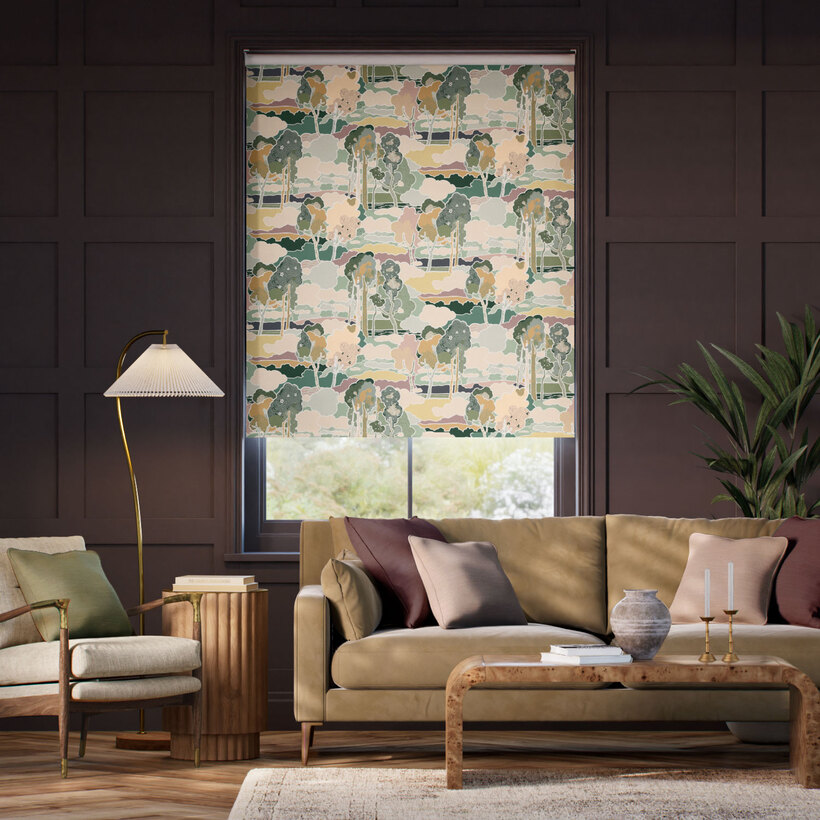Living room with neutral-toned furniture contrasted by colourful patterned blind. - decorative blinds