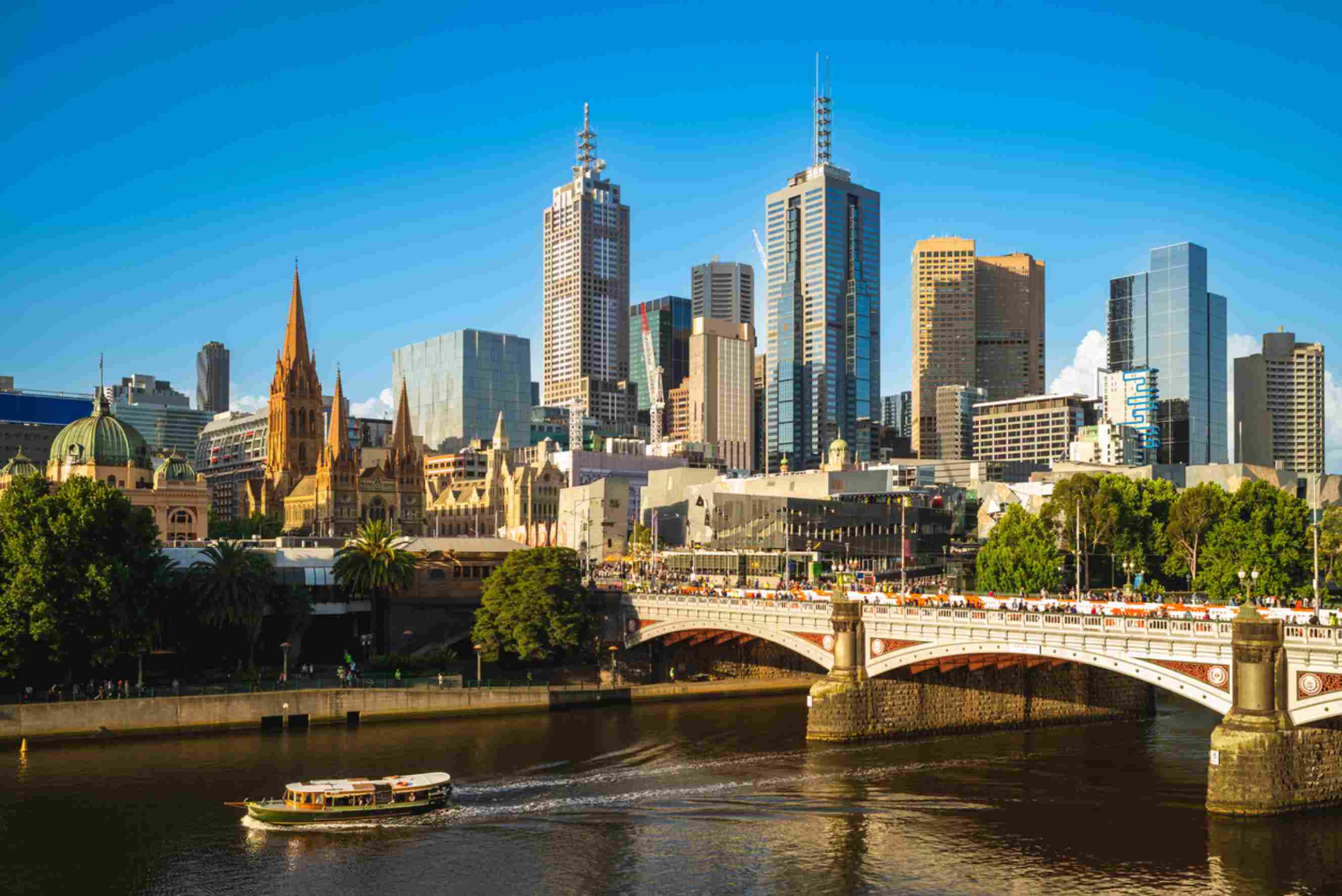Melbourne city skyline with the Yarra River and Princes Bridge, a popular destination for people moving from Adelaide