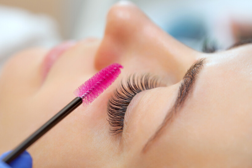 Close-up of long eyelashes to show the results of a successful lash treatment. - lash lift and tint vs extensions