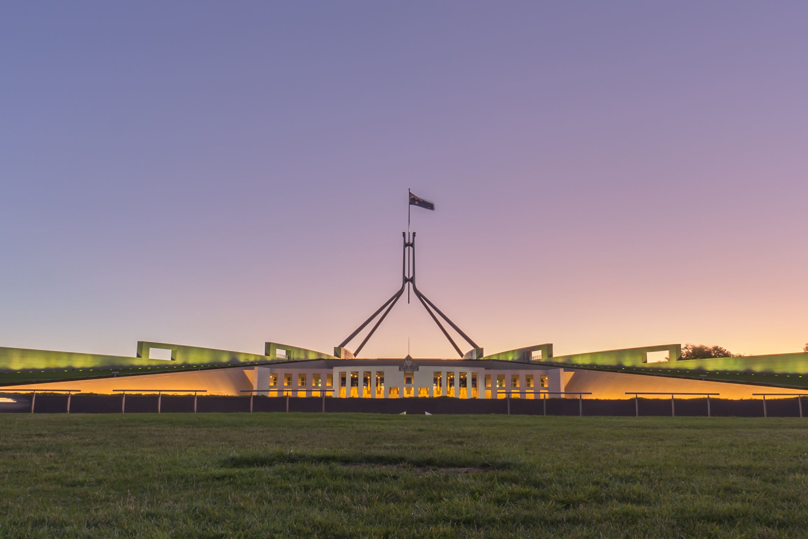 Beautiful scene of sunset at Parliament House Canberra, Australia symbolizing Sydney to Canberra removal services.