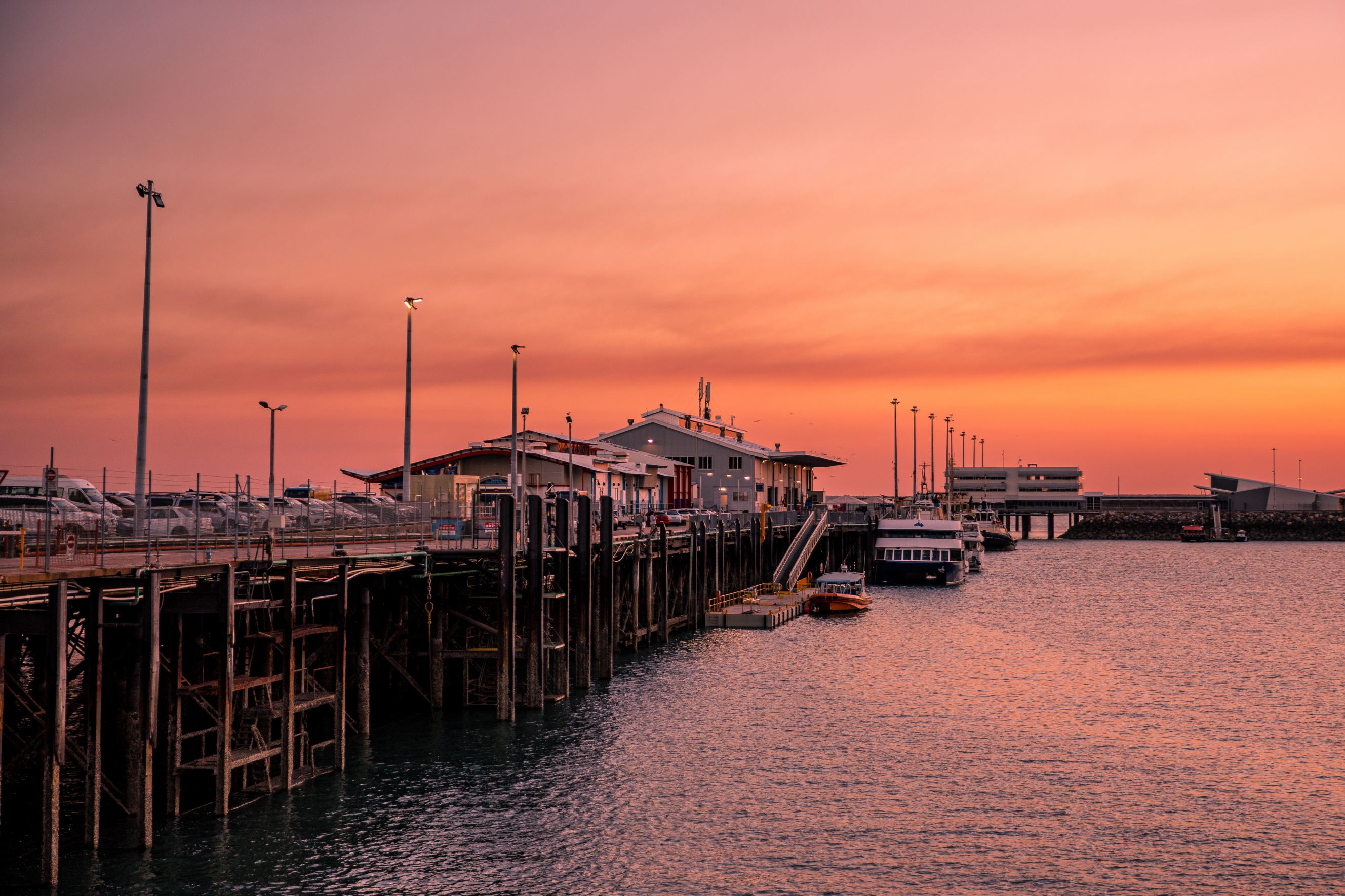 Sunset over the Stokes Wharf and the Waterfront precinct in Darwin symbolising Perth to Darwin removal services.