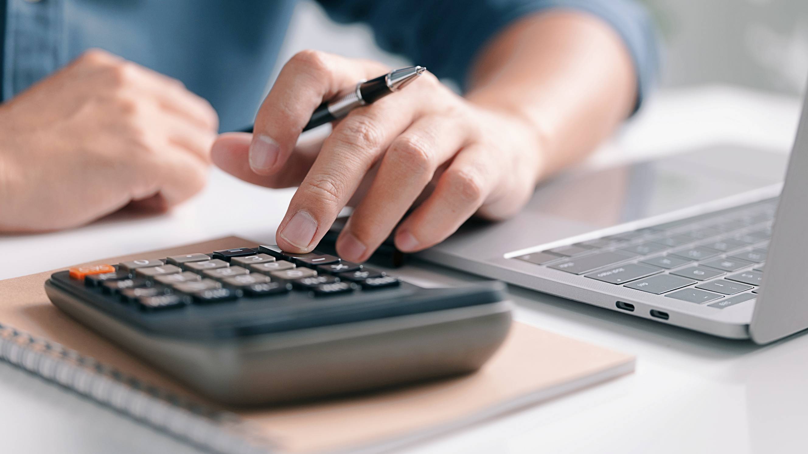 a man calculating taxes