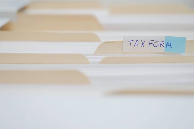 how much does a tax accountant cost - Tax form label on file folder tabs