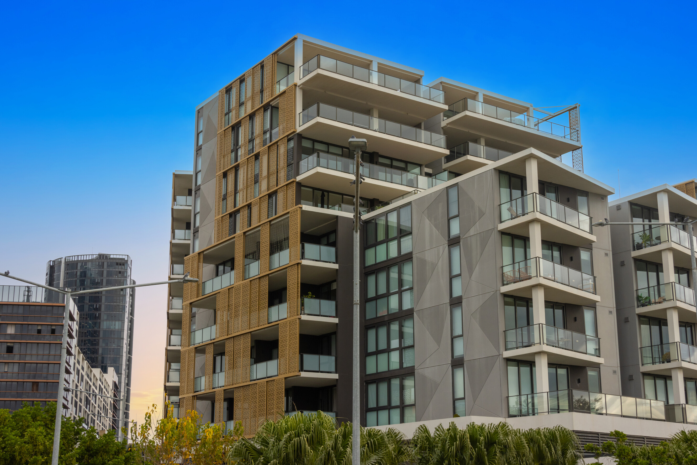 An apartment complex in an inner Sydney suburb, viewed from the street.