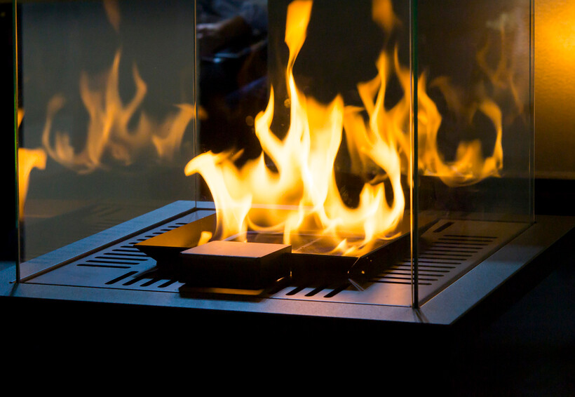 A sleek bio-ethanol fireplace burning cleanly without a chimney. - indoor fireplace