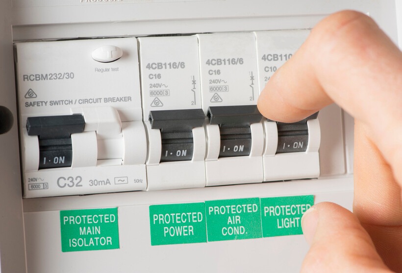 Residential switchboard with labelled circuit breakers organised in a panel. - how to use switchboard