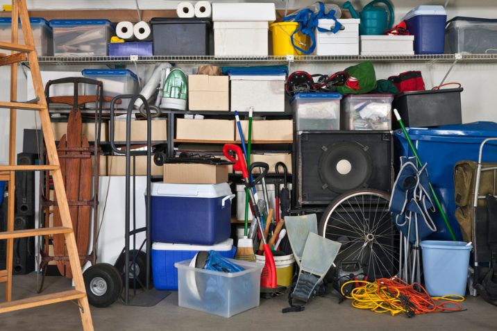 Household items, furniture, and seasonal equipment neatly organized inside a self storage unit