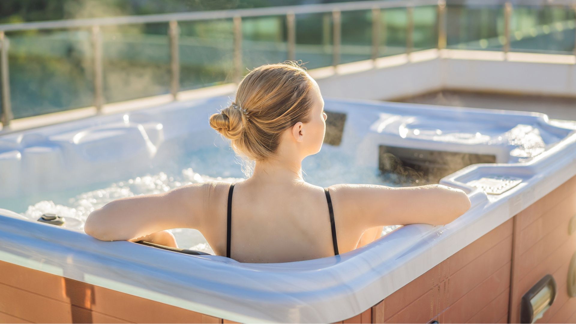a woman enjoying a swim spa