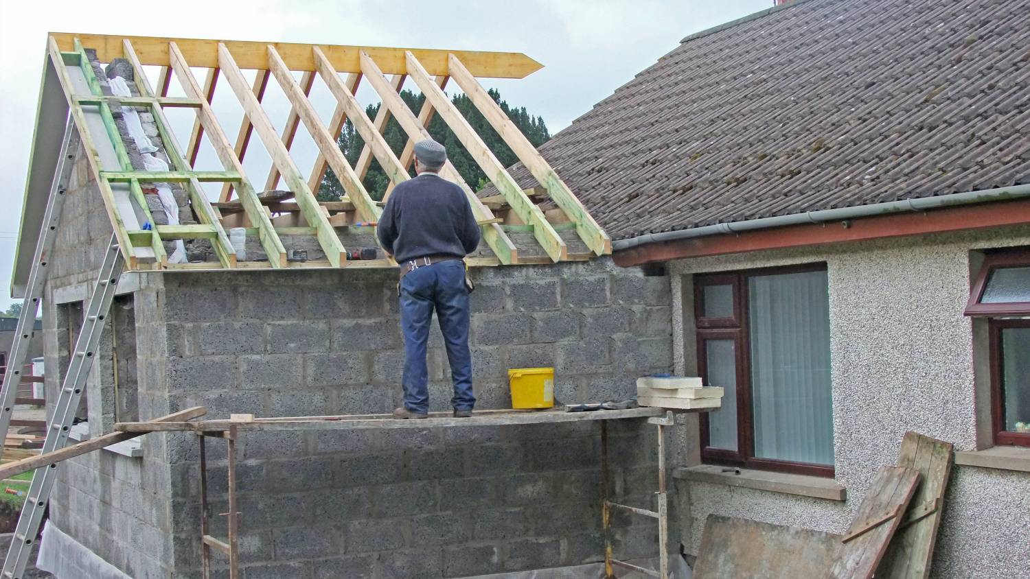 handyman building conservatory roof