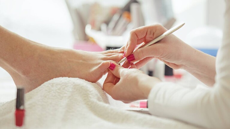 nail technician pedicure service