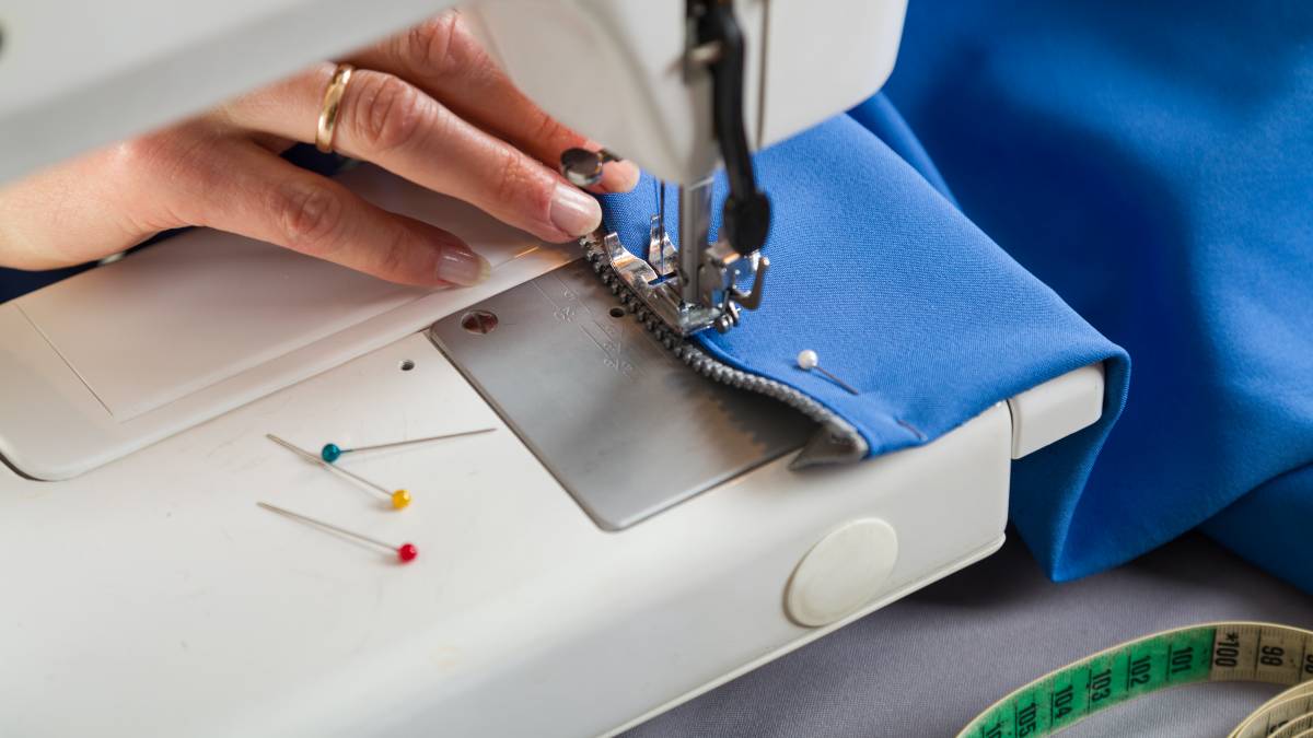 sewing a zipper in the sewing machine