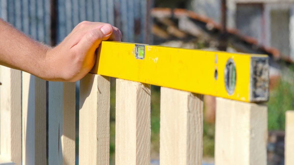 height & balancing wood fence