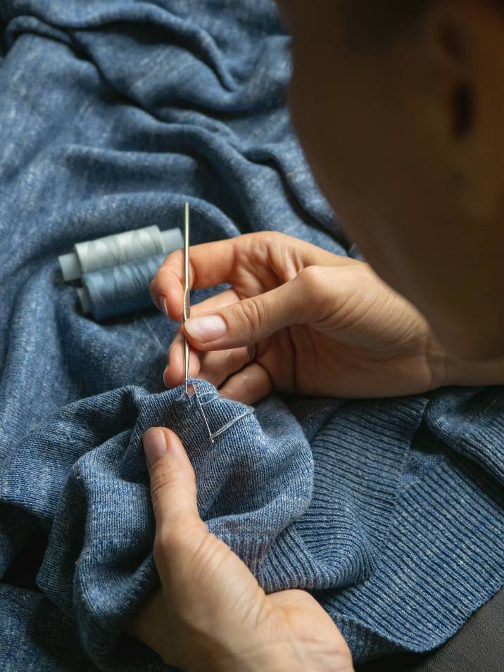 Clothing restoration. Repairing hole in clothing with crochet