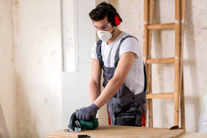 handyman wearing safety equipment at work