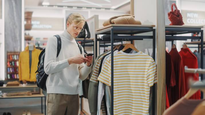 mystery shopper looking at cool finds in a store