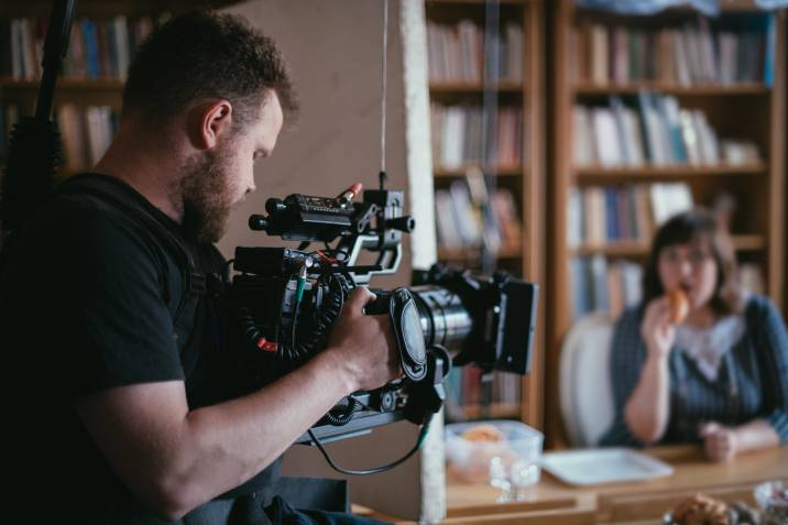 videographer shooting a movie scene