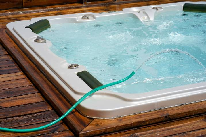 refilling a hot tub with water