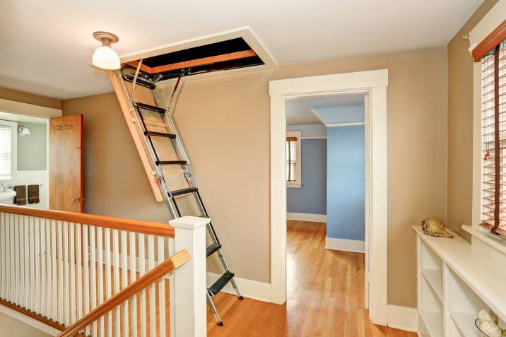 pull-out attic ladder installed in the second floor of a home