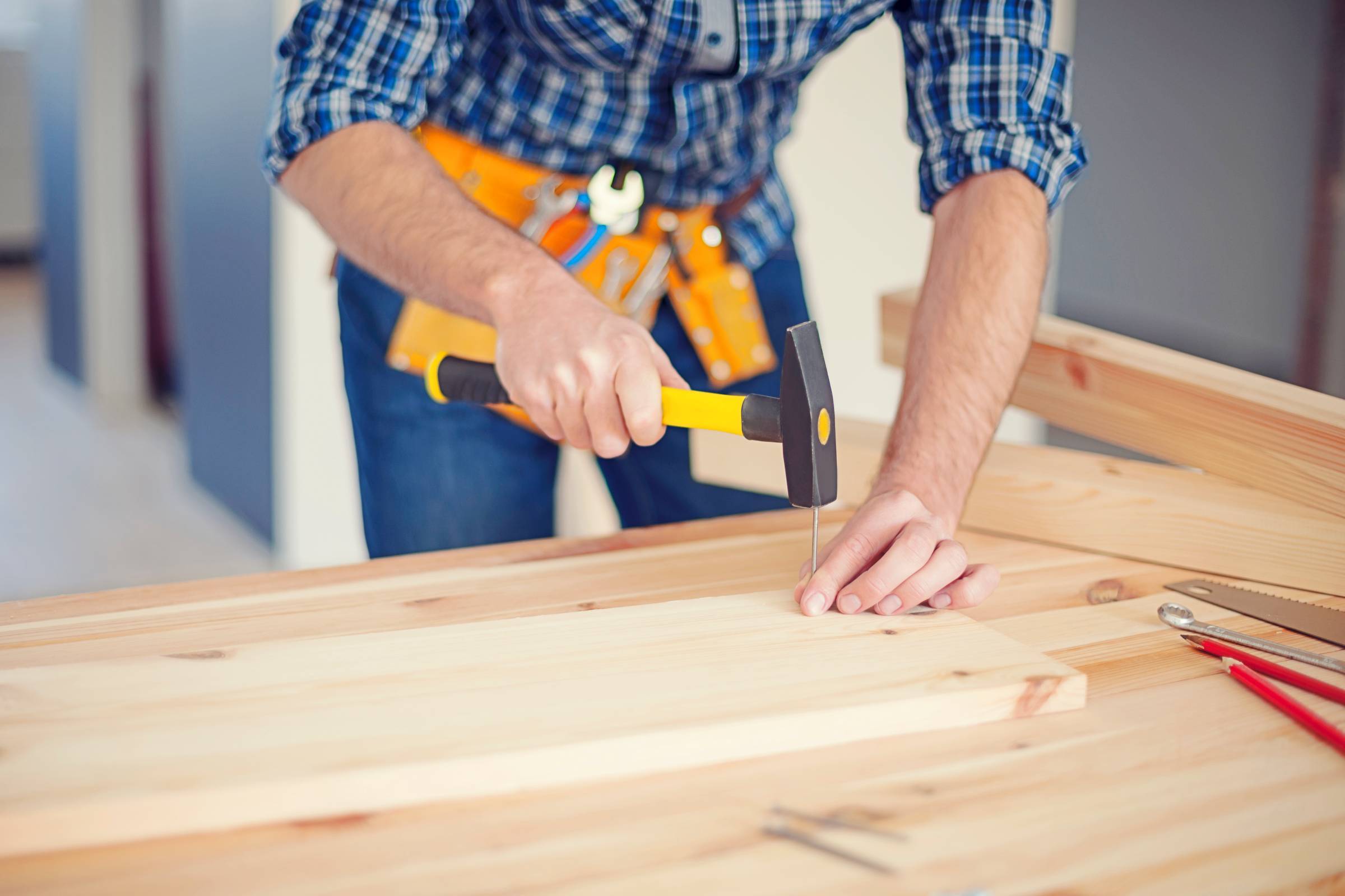 a carpenter with a hammer