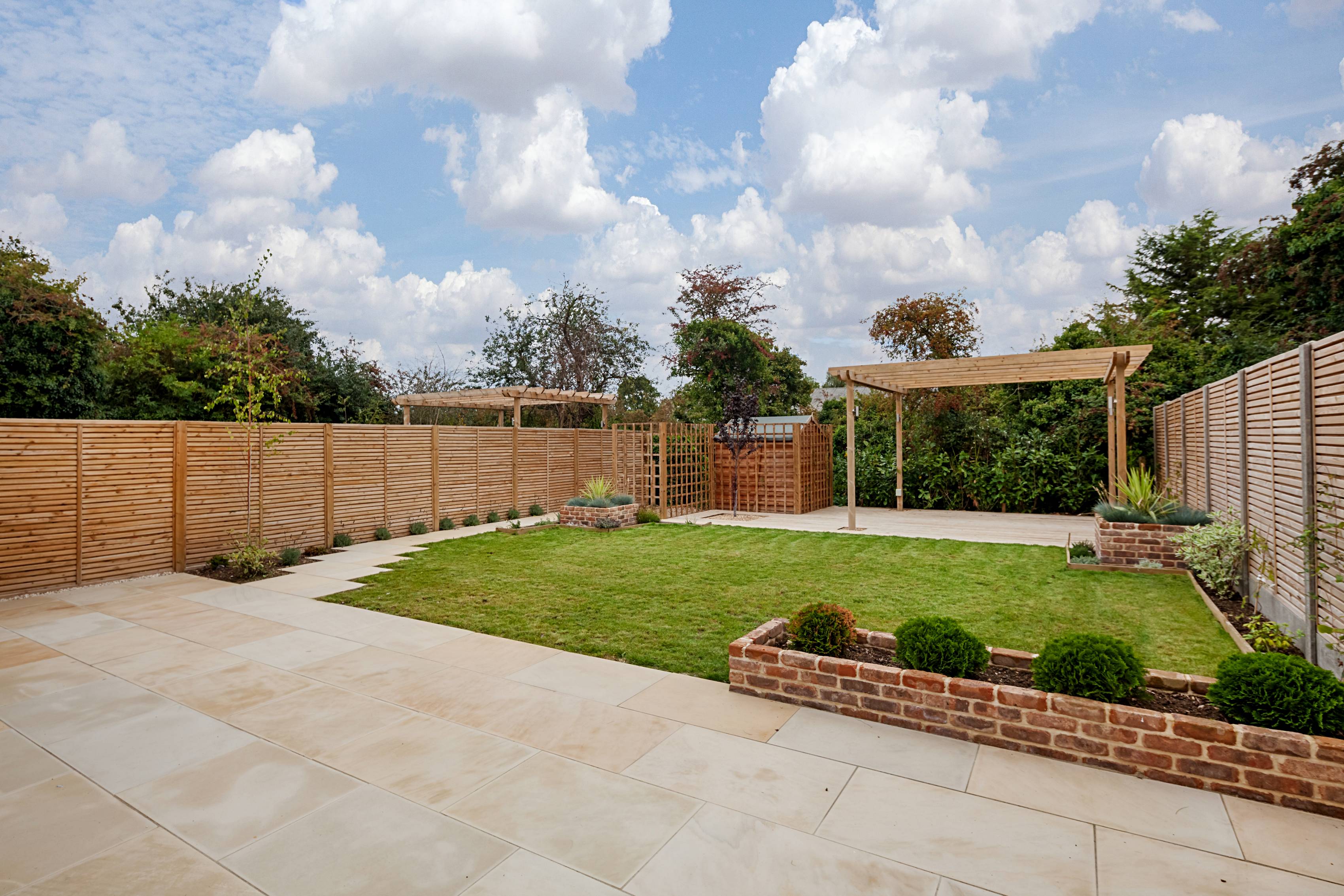 a property with a large patio garden