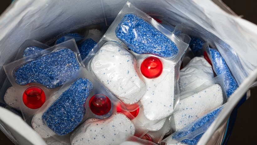 Dishwasher powder vs tablets - Closeup of dishwasher tablets in a storage bag