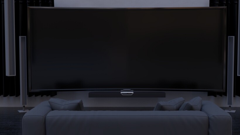 Soundbar vs surround sound - Modern living room with an HDTV and a soundbar