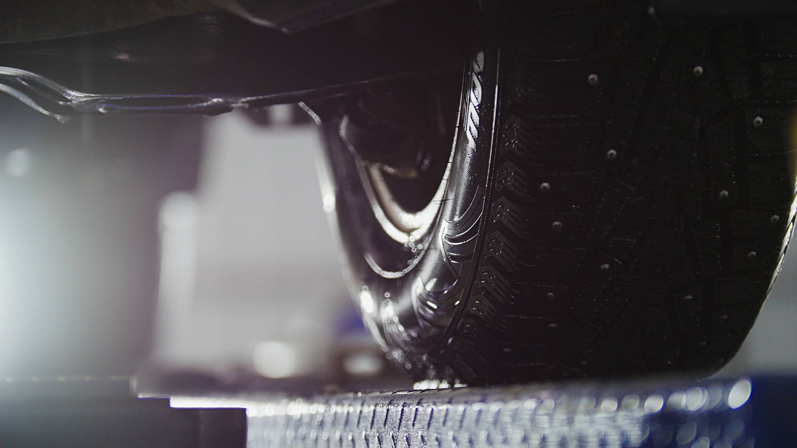 a car being prepared for wheel alignment