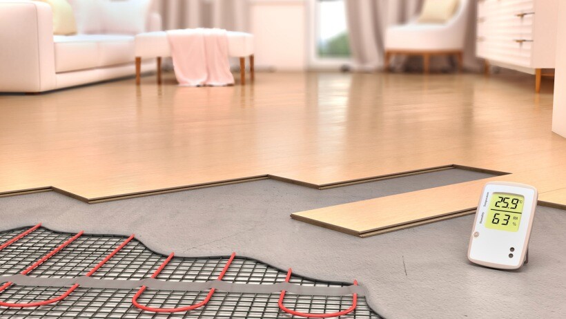 Underfloor heating vs radiators - Parquet boards on floor with underfloor heating