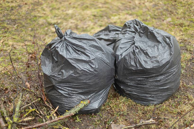 how to dispose of garden waste - black bags full of garden rubbish