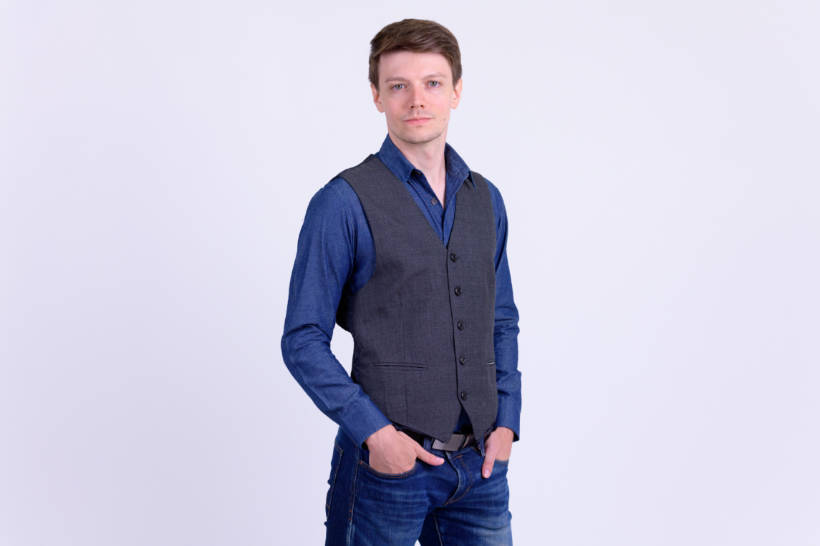 Waistcoat vs Vest - Man wearing a formal waistcoat over a casual denim shirt