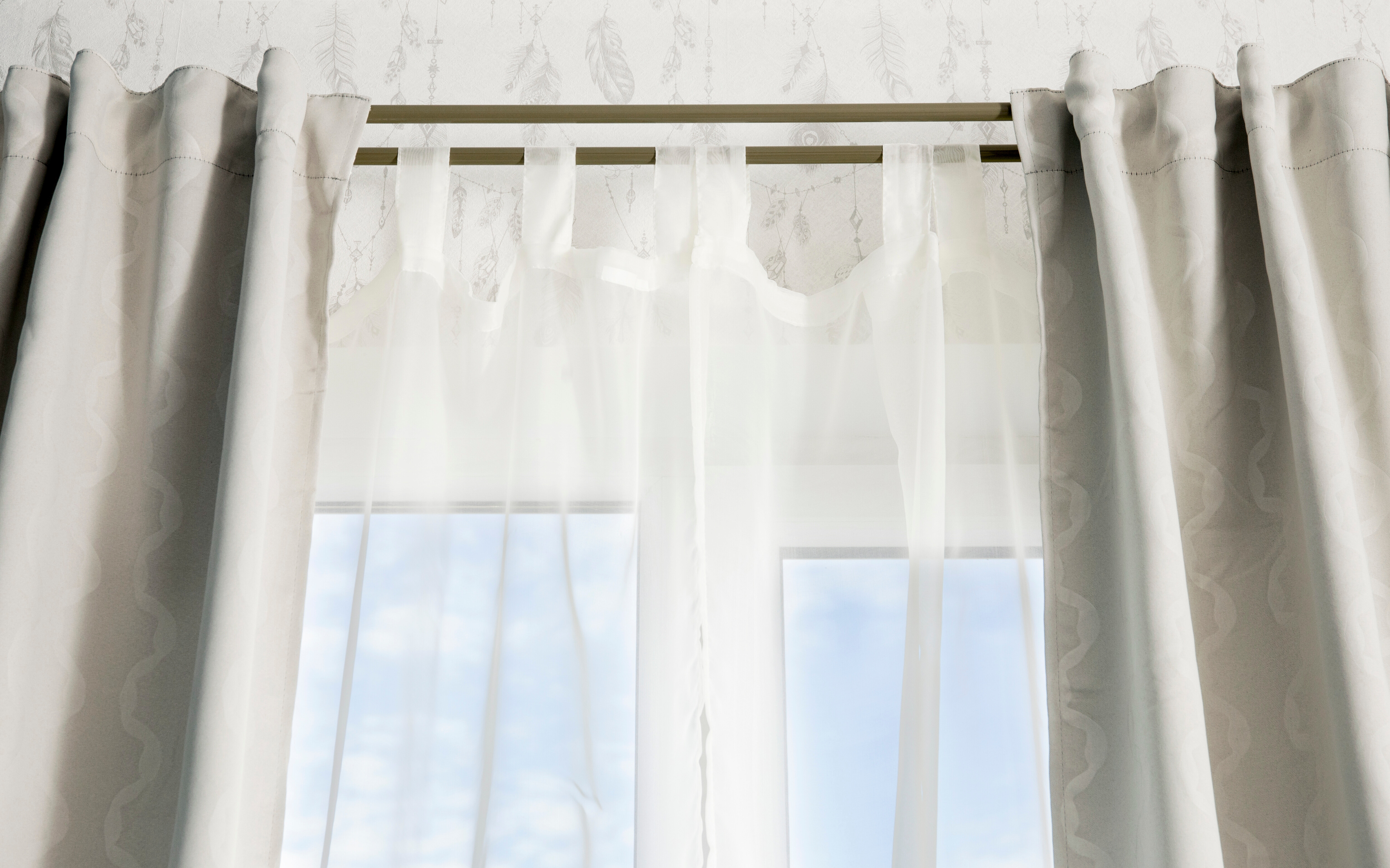 Curtain ideas - Tab top curtains hung on a rod with light filtering fabric