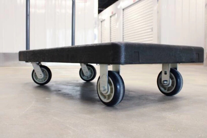 How to move furniture - Heavy-duty dolly cart used for moving appliances like freezers.