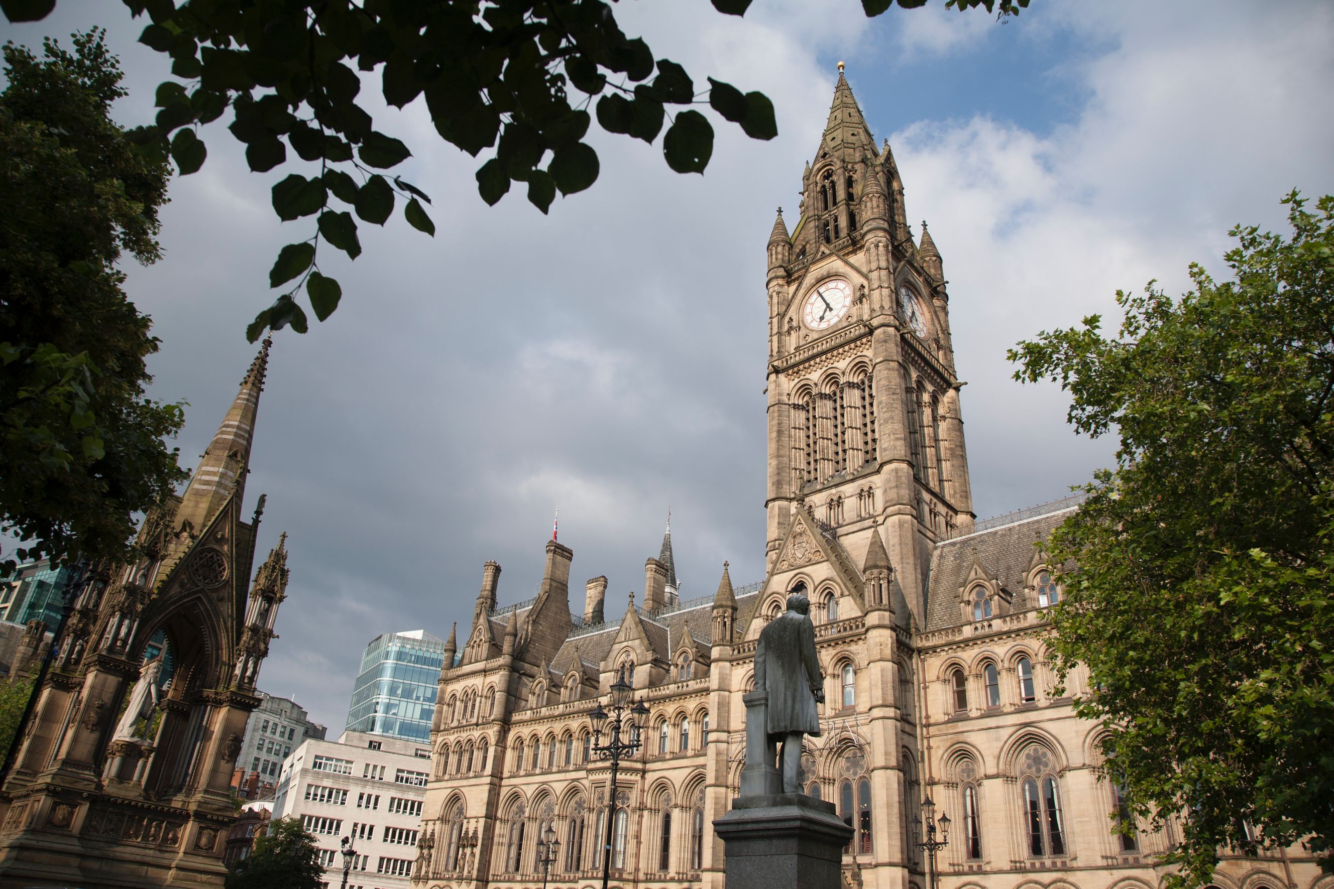 Albert Memorial by Noble (1867) and Town Hall, Albert Square, Manchester, England.