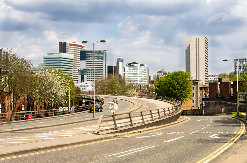 View of curved roads leading towards Croydon’s modern high-rise skyline. - moving to Croydon