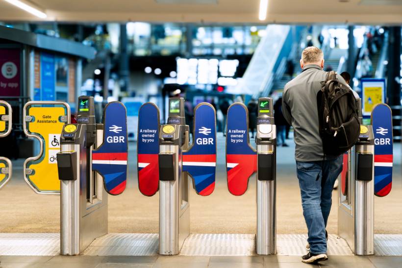 moving to Leeds - Passenger walking through ticket barriers at a Great British Railways station