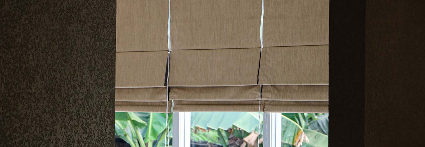 A close-up view of Roman blinds.