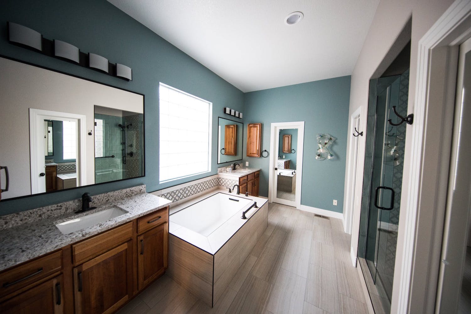 spacious modern bathroom with tub