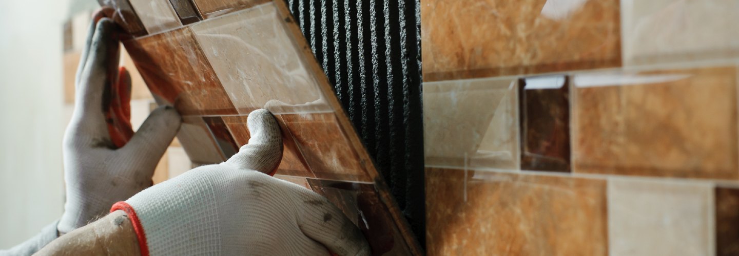 A close-up view of a beautifully tiled kitchen backsplash.