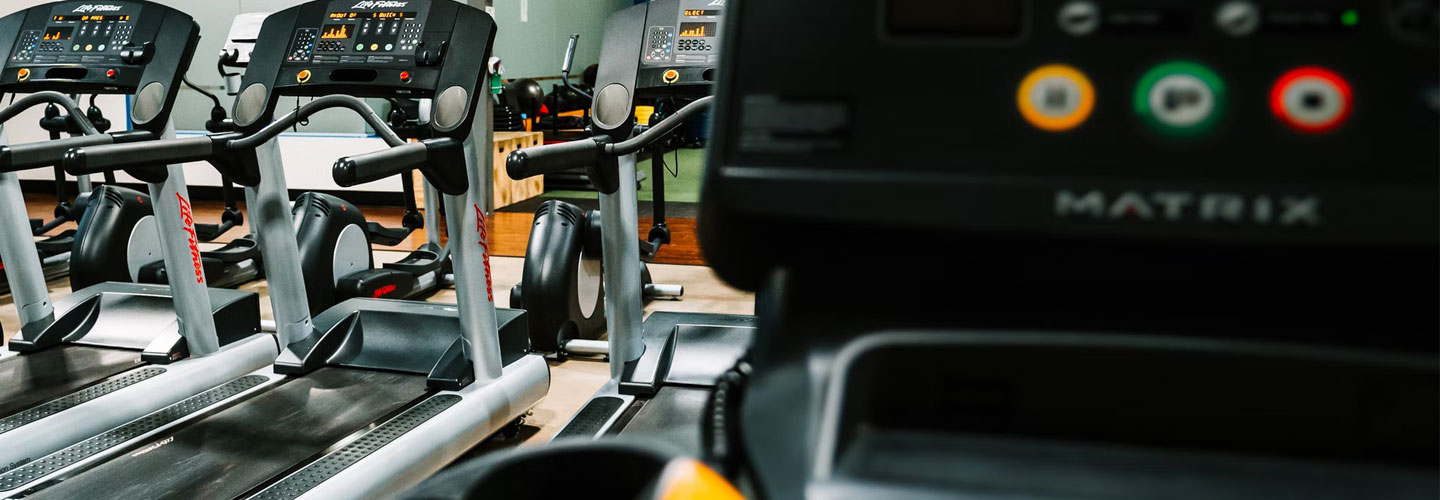 A set of treadmills in a gym.