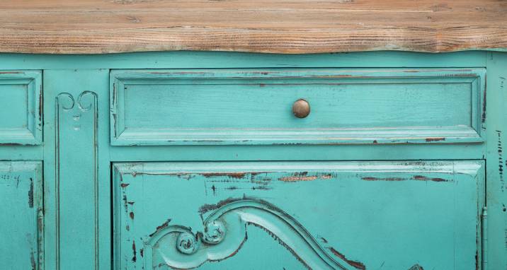 distressed paint effect on cabinet
