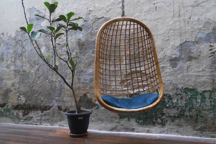 Hanging chair for a sunroom