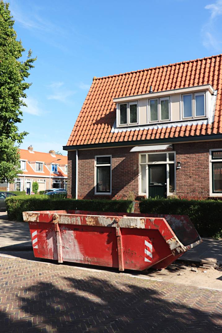 a rented dumpster outside a home