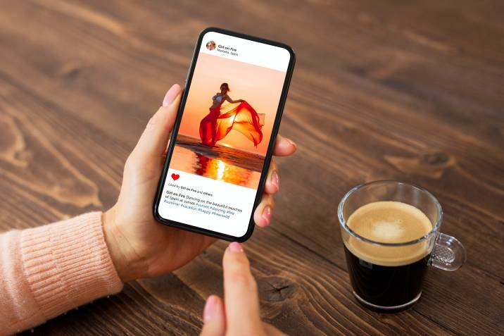 Looking at Instagram photo on phone, social media copywriting to earn money writing 