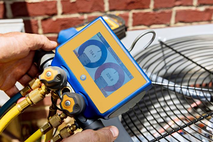 a man performing HVAC tune-up