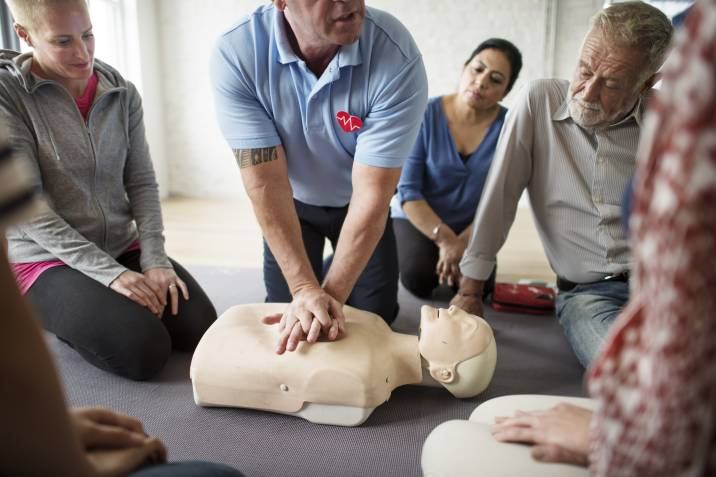 medical expert teaching CPR